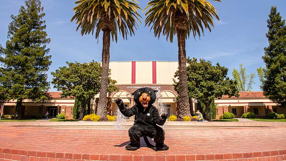 Sacramento City College's panther mascot outside of the performing arts center