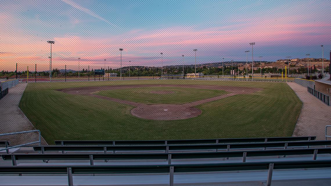 Empty baseball field during sunset